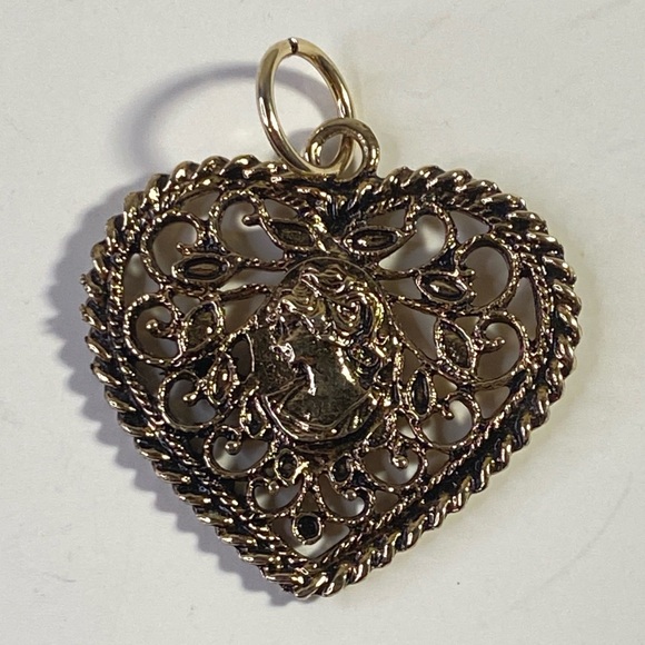 Vintage Jewelry - Vintage filigree woman cameo heart pendant